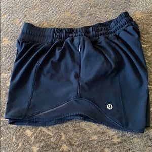 Navy Lululemon Hotty Hot short 4”, size 6.